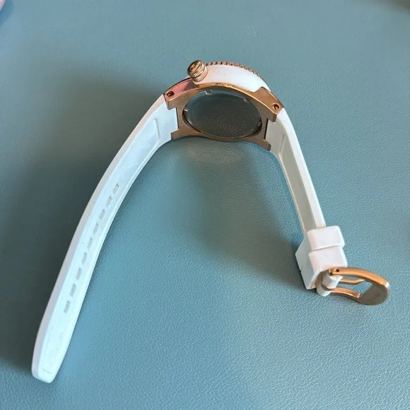 Swiss Legend, Neptune, white and rose gold watch. Has instruction manual.